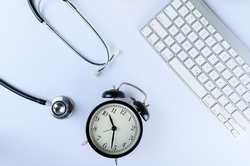 Conceptual,stethoscope on a white table