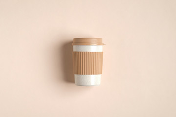 Fototapeta na wymiar Eco friendly reusable coffee cup with lid for travel. Takeout coffee cup made from organic bamboo fiber. Zero waste, plastic free, sustainable lifestyle concept.