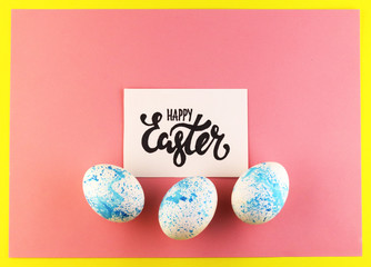 happy Easter lettering on a pink background