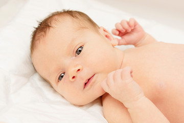 Portrait of a beautiful sleeping new born baby. Health care, motherhood.
