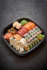 Various kinds of sushi on plate or platter set