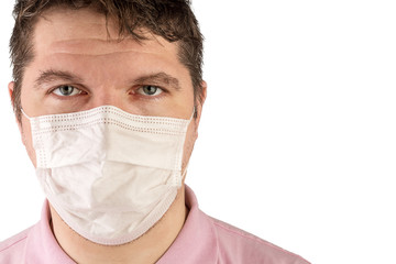Portrait of adult caucasian man who wears protective mask on his face against influenza and protect health from bacteria.