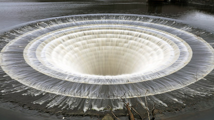 Slow shutter speed image of the Ladybower Reservoir overflow, Derbyshire