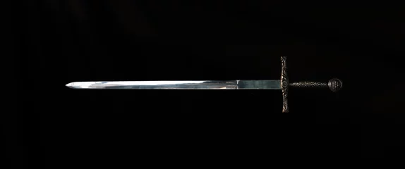 Fotobehang medieval knight's sword on a black background © serikbaib