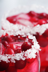 Glasses with red cranberry cocktail	