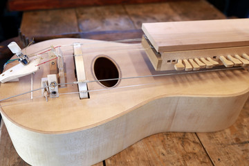 Fototapeta na wymiar Old wooden hurdy gurdy