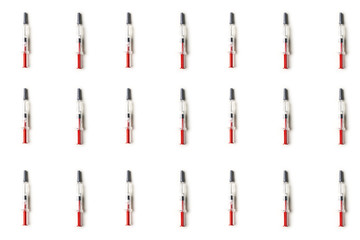Plastic injectors pattern on white background isolated