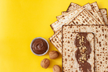 Jewish matzo sandwich with chocolate paste and walnuts on Passover.