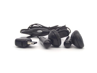 Earphones for mobile phone isolated on white background. Black earbud for smartphone.