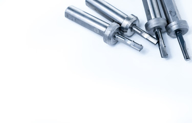 Set of special tools on white background. Made to order special tools. Closeup detail tip of reamer. HSS cemented carbide. Carbide cutting tool for industrial applications. Industry special tools.