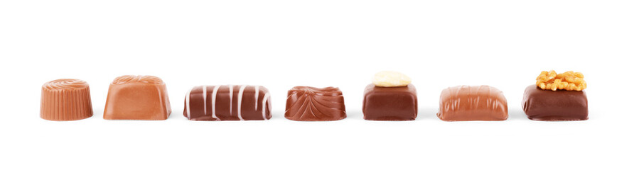 Various chocolate candies isolated on white background