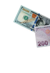 One Hundred Usa Dollar and Turkish Two Hundred Liras isolated on white surface.This image can be used horizontally or vertically