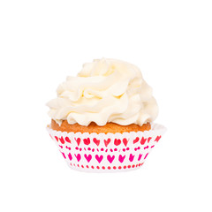 Cupcake with white buttercream frosting isolated on white background.