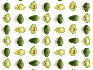 green avocado on white background