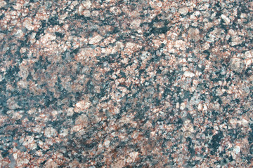 Closeup of grey granite texture background.