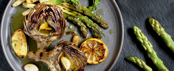 artichoke and asparagus grill. Tasty vegetables are first cooked for a couple, then fried on a...