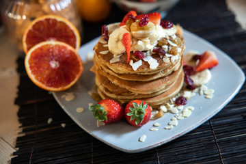 pankake breakfast with yogurt honey and strawberries