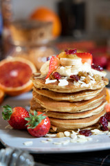 pankake breakfast with yogurt honey and strawberries