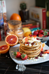 Obraz na płótnie Canvas pankake breakfast with yogurt honey and strawberries