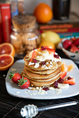 pankake breakfast with yogurt honey and strawberries