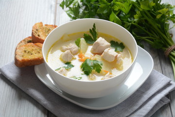 Creamy soup with chicken and vegetables 