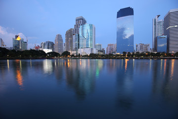 Fototapeta na wymiar Cityscape in the evening view from Benjakiti park in Bangkok, Thailand 2