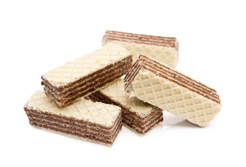 Crispy wafers with creamy hazelnut filling isolated on white background