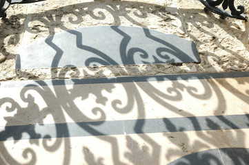 Ornate gate Shadows