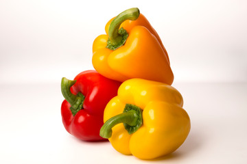 three peppers isolated on white background
