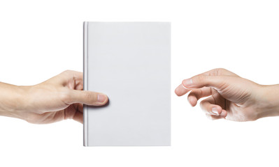 Obraz premium Hands sharing blank white hard cover book, isolated on white background