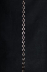 Fototapeta na wymiar iron chain on a black background