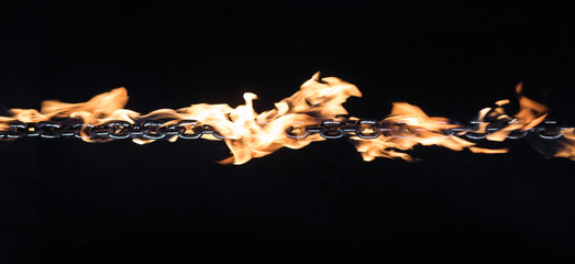 iron chain on fire on a black background