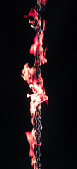 iron chain on fire on a black background