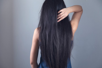 Fototapeta premium woman touching in long hair