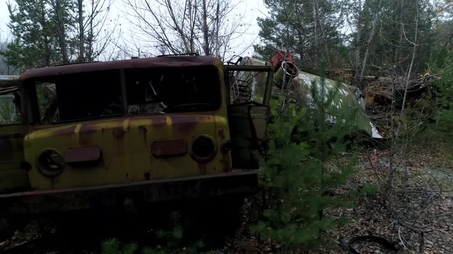  Equipment cemetery in the Chernobyl exclusion zone. City of Pripyat. Drone video in the fog 4