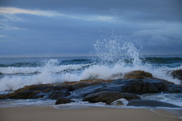 waves crashing on the beach