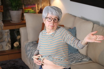 Woman measuring her body fat percentage