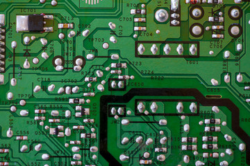 Close-up of electronic components. SMD resistors, capacitors, inductors and integrated circuits.