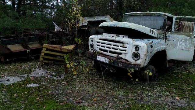  Equipment cemetery in the Chernobyl exclusion zone. City of Pripyat. Drone video in the fog  3