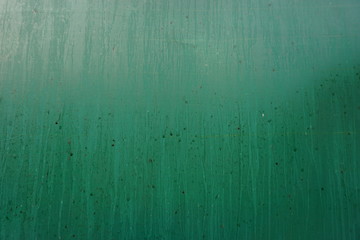 Green  metal  plate  with  water  stain  texture.