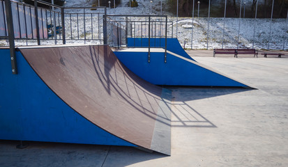 Fototapeta na wymiar skateboard slide in a city Park