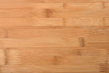 Wooden background made of pressed bamboo.