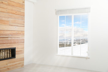 Beautiful view of snowy mountains through big window