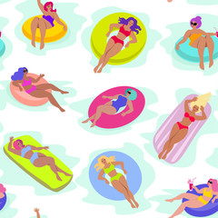Young womans on inflatable in swimming pool floats.