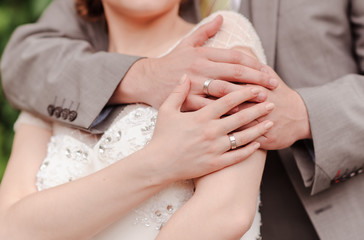 Fototapeta na wymiar bride and groom holding hands
