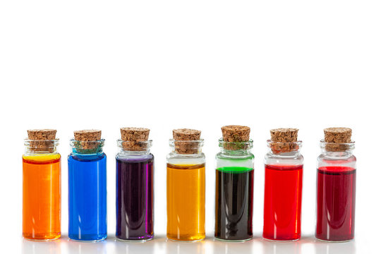 Bottles Of Food Coloring Isolated On A White Background