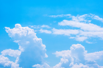 Naklejka na ściany i meble Blue sky with white clouds nature background