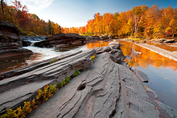 Fall colors at Bonanza Falls on the Big Iron River in Michigan's Upper Peninsula.