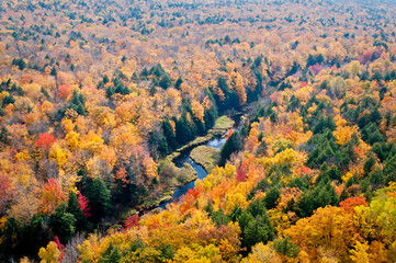 View of the Carp River Valley and autumn colors from the Lake of the Clouds Scenic Overlook, Porcupine Mountains Wilderness State Park, Michigan. 