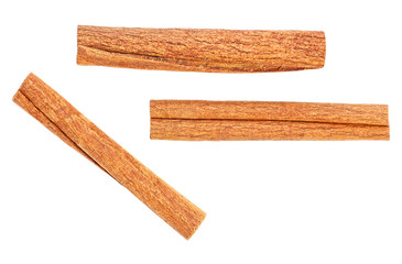 Fragrant cinnamon sticks isolated on a white background, top view.